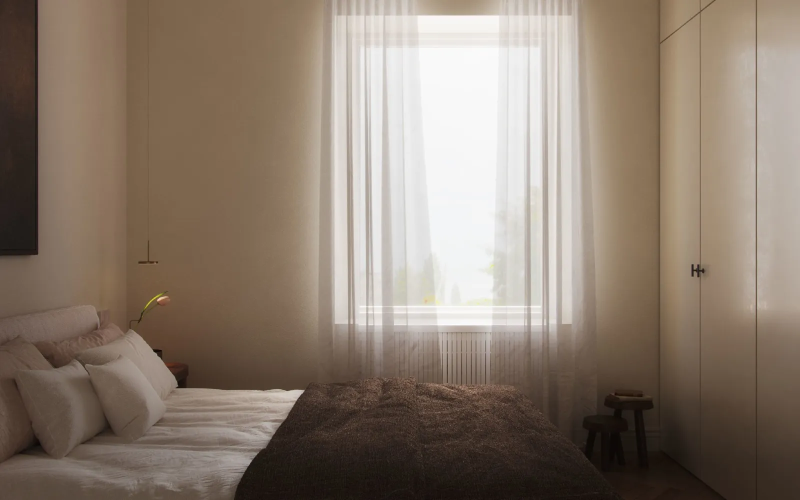 Modern bedroom decor with soft neutrals, warm lighting, and a cozy aesthetic. Minimalist interior with a plush bed, sheer curtains, and natural textures. #MinimalistBedroom #ModernDecor